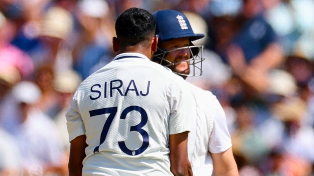 Mohammed Siraj, left, celebrates the dismissal of Ben Duckett, right, during the fourth day of the third cricket Test between England and India at Lord's cricket ground in London. (AP Photo)