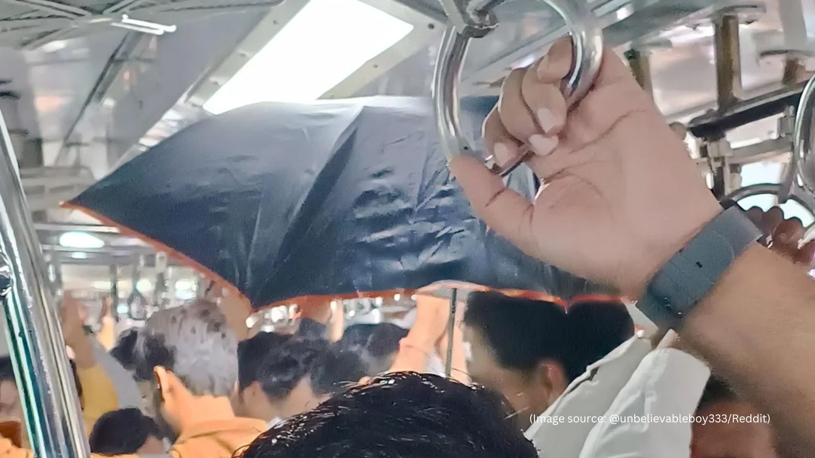 Mumbai Train Passenger with Umbrella Goes Viral