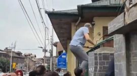 Omar Abdullah jumps fence Martyrs day Kashmir