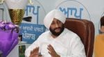 AAP leader Deepak Bali (Centre) after taking charge of advisor to Punjab Heritage and Tourism Board.