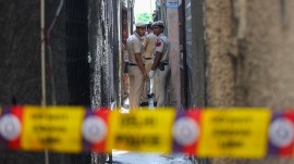 Police personnel at the crime spot on Tuesday. Praveen Khanna Woman, friend’s 6-month-old baby killed by partner: Police