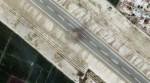 This satellite image provided by Maxar Technologies shows building and other damage at Rahim Yar Khan in Pakistan
