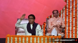 MNS chief Raj Thackeray addresses a victory rally in Mumbai on Saturday with Shiv Sena (UBT) president and his cousin Uddhav Thackeray by his side