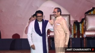 Shiv Sena (UBT) chief Uddhav Thackeray with his cousin and MNS president Raj Thackeray at the NSCI Dome in Worli on Saturday.