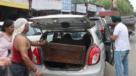 While many traders had already shifted their furniture, a few still had stock left. These shopkeepers were given a brief time to clear out before the demolition commenced in their shops.