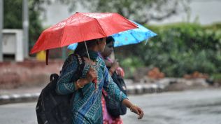 Pedestrians during rainfall, in New Delhi, Thursday, July 10, 2025. (Photo/PTI)