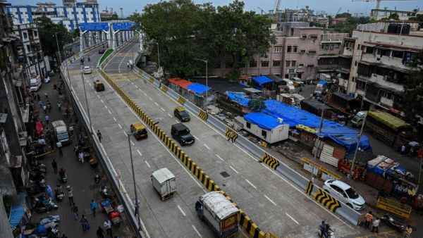 Vehicles ply on Sindoor Bridge after it has been open for vehicular traffic today, in Mumbai on 10 July 2025. Express photo by Sankhadeep Banerjee.