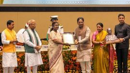 President Droupadi Murmu presents the 'Swachh Shehar - Rank 1' award (in more than 10 lakh population category) to Ahmedabad as Union Minister for Housing & Urban Affairs Manohar Lal and MoS for Housing & Urban Affairs Tokhan Sahu applaud during the Swachh Survekshan Awards ceremony, in New Delhi