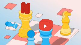 The two giant video companies have far different strategies, but the same goal: controlling your TV set.