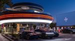 Tesla’s branding is visible throughout the diner.