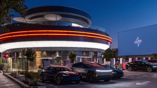 Tesla’s branding is visible throughout the diner.