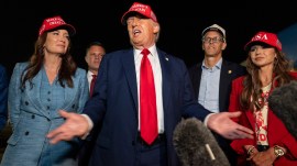 US President Donald Trump speaks with reporters on Friday