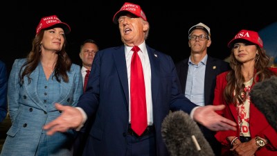 US President Donald Trump speaks with reporters on Friday