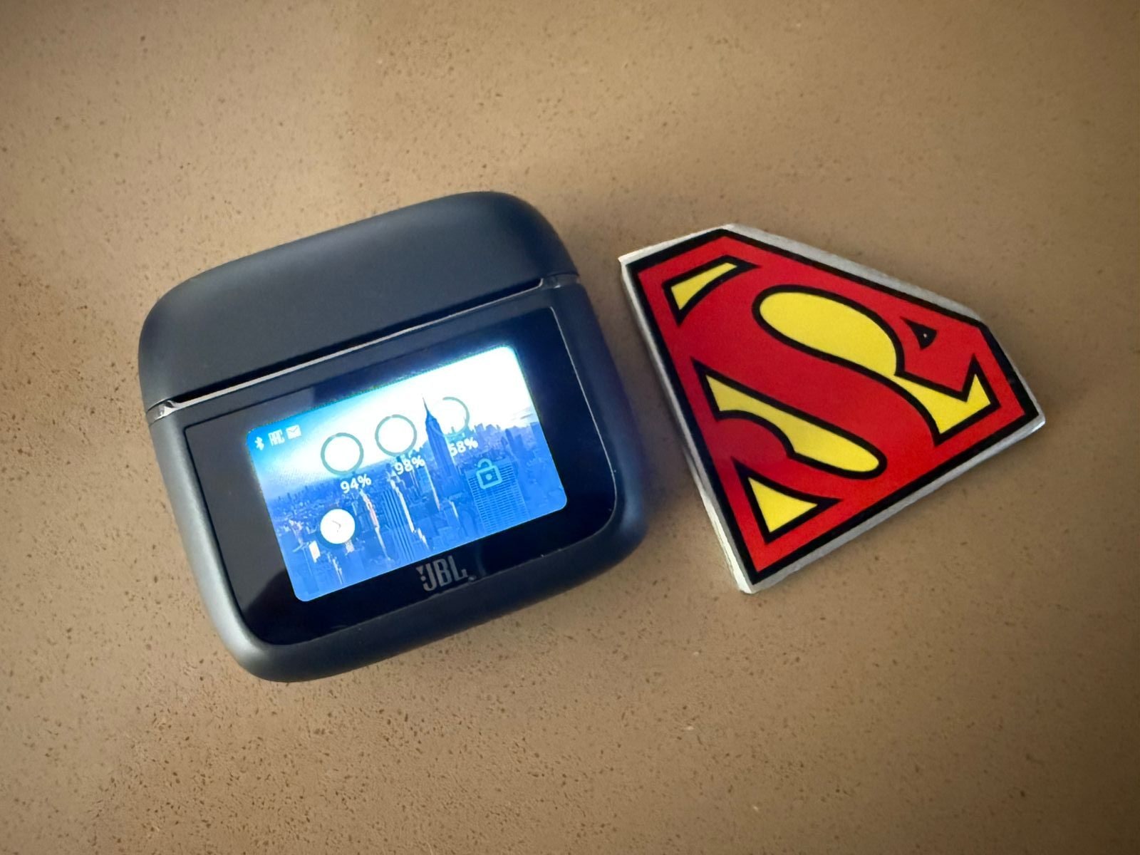 The display on the charger shows the home screen by default.