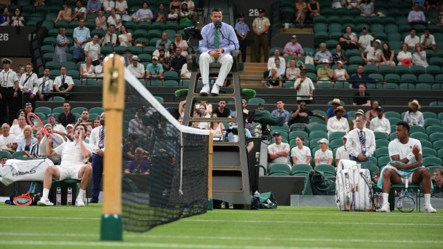 The electronic line-call system was developed by Hawk-Eye and uses AI to analyse footage from up to 18 cameras tracking the progress of the ball across the court. (AP)