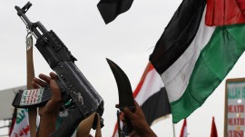 Houthi supporters shout slogans during a protest in Yemen