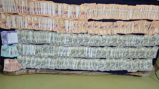 Vigilance officials said they unearthed Rs 1.4 crore concealed in a secret treasury at one of his flats in Jeypore town.