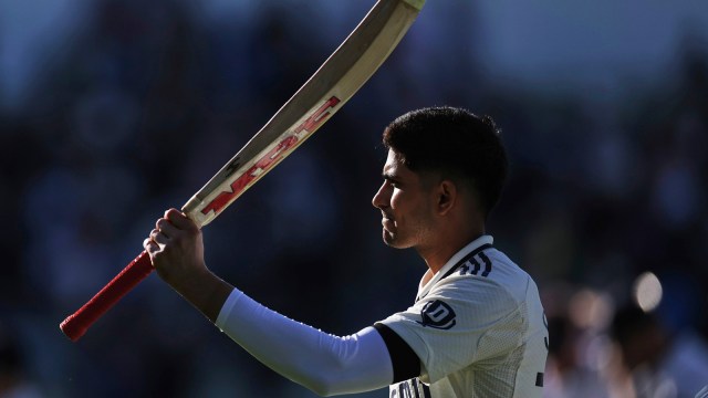 India's captain Shubman Gill acknowledges the applause from the crowd as he leaves the field at the end of play on day one of the second cricket test match between England and India at Edgbaston in Birmingham, England, Wednesday, July 2, 2025. (AP Photo/Scott Heppell)