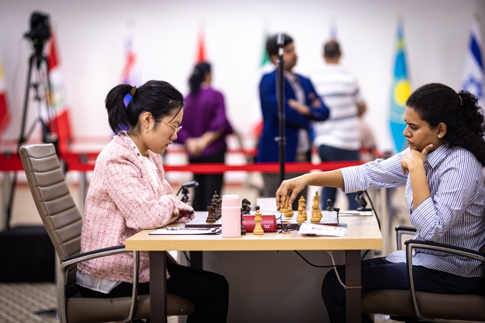 By just the 13th move, Yuxin had already gained a minute and 46 seconds on the clock on top of the allotted 90 minutes while blitzing out her moves in the opening and was ahead by nearly 34 minutes after Humpy was down to less than an hour, thinking deeply about her early moves. (Photo credit: Anna Shtourman/FIDE)