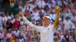 Jannik Sinner celebrates after beating Novak Djokovic in a men's singles semifinal at the Wimbledon Tennis Championships in London, Friday, July 11, 2025. (AP Photo)