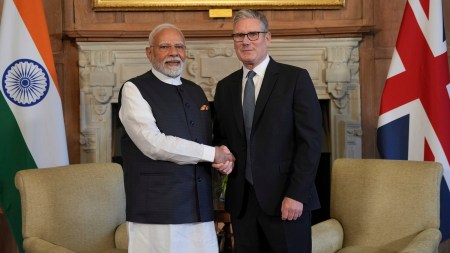 Britain's Prime Minister Keir Starmer welcomes Indian Prime Minister Narendra Modi at Chequers near Aylesbury, England.
