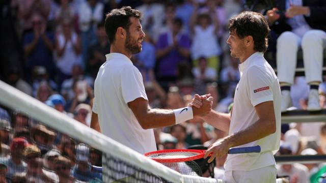 Fifth-seeded Fritz went on to win the match 6-3, 6-4, 1-6, 7-6 (4) and advanced to the Wimbledon semifinals. (AP Photo)