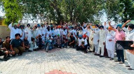 Villagers at Malakpur village.