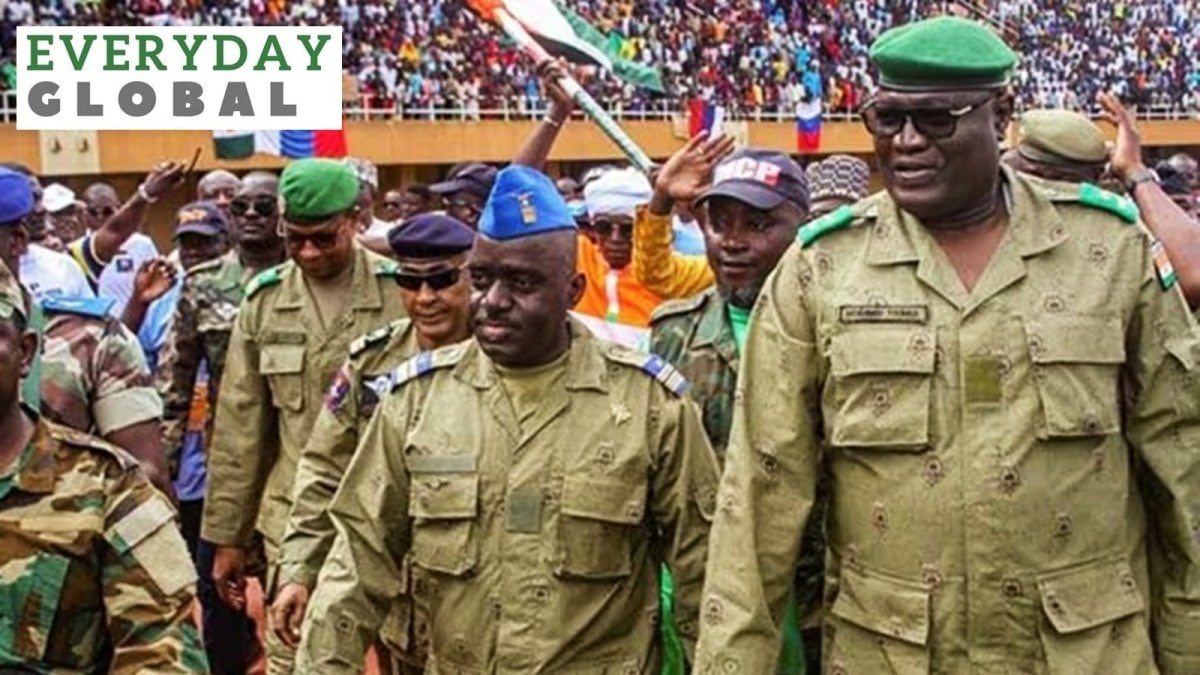 Members of a military council that staged a coup in Niger attend a rally at a stadium in Niamey, Niger, August 6, 2023.