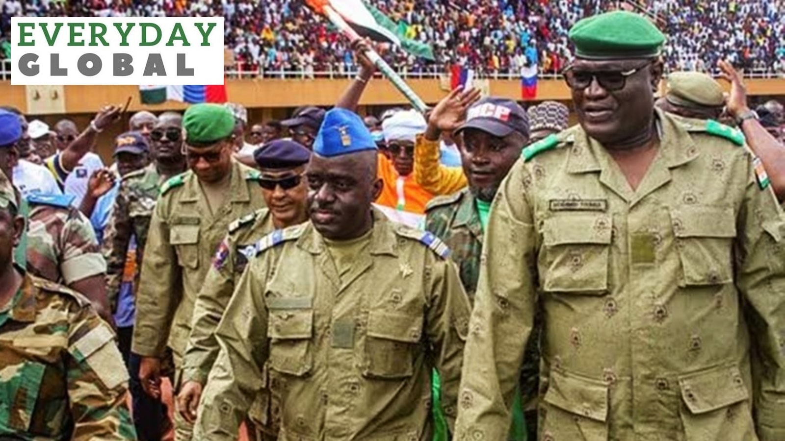 Members of a military council that staged a coup in Niger attend a rally at a stadium in Niamey, Niger, August 6, 2023.
