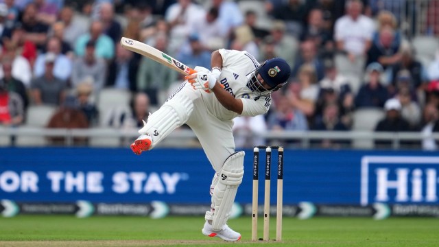 Rishabh Pant remarkably continued his innings while batting almost on one foot and scored 54 in 75 balls but Dhruv Jurel is keeping wickets. (AP Photo)