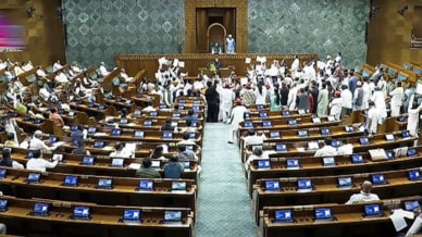 Opposition members protest in the Lok Sabha demanding discussion on the Special Intensive Revision (SIR) of electoral rolls in poll-bound Bihar