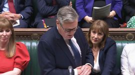 This screen grab of Chancellor of the Exchequer Rachel Reeves, right, crying as Prime Minister Keir Starmer speaks during Prime Minister's Questions in the House of Commons, London, Wednesday July 2, 2025. (House of Commons/UK Parliament via AP)