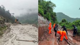 An earthmover clears the sludge after the Gangotri National Highway gets blocked by falling debris following heavy rains, in Uttarkashi; Workers clear debris from a railway track following heavy rainfall, near Koti railway station, in Solan district.