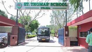 A vehicle of Delhi Police at St. Thomas School following a bomb threat email, at Dwarka in New Delhi