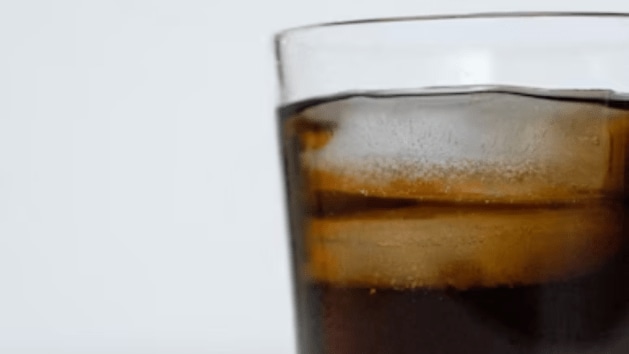 kick giving cold drink, lifestyle