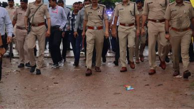 Police officers walking on the road