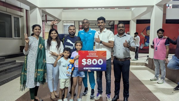 Sprinter Animesh Kujur with his family at the World Athletics Continental Tour event, in Bhubaneswar. (Express Photo by Pritish Raj)