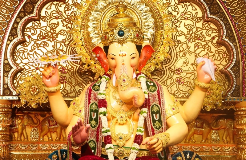 "It is themed on Tripati Balaji," Kambli, whose family has been sculpting the idol since its inception, told The Indian Express, adding that the theme was decided by the pandal and communicated to him. It took him over a month to sculpt the idol.