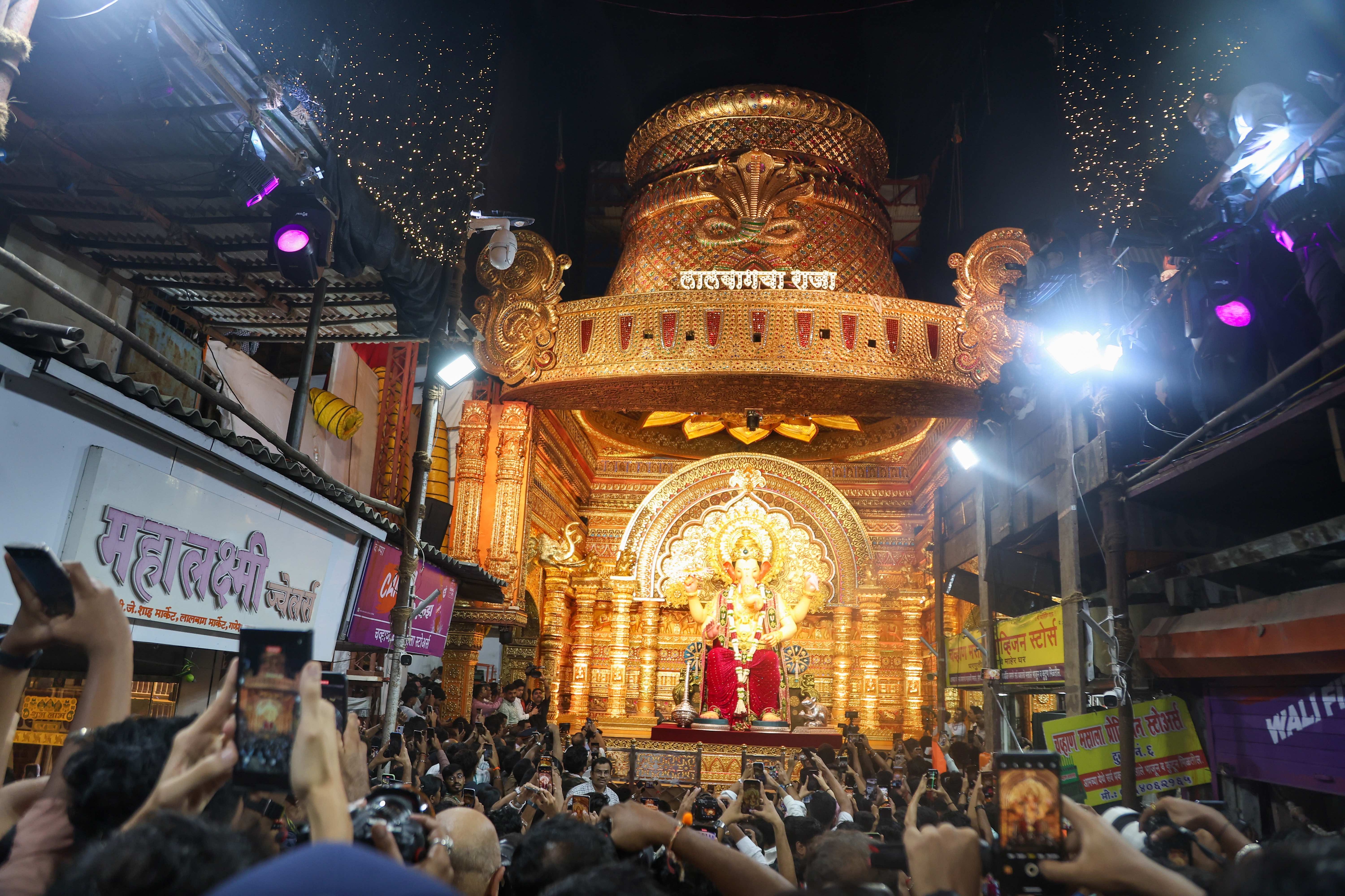 The pandal is located in Lalbaug, Parel, and is accessible by road and rail. 
