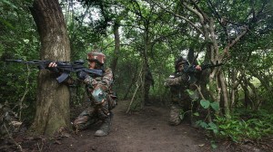Indian Army jawans keep watch near the Line of Control in Jammu and Kashmir