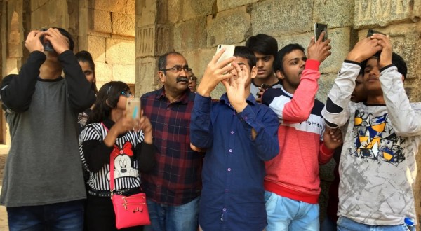Partho Bhowmick with his visually impaired students during a 'Blind with Camera' workshop. (Express Photo)