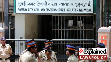 Police officials stand guard outside the sessions court during the 1993 bomb Blast Verdict on Thursday. Express Photo by Prashant Nadkar. 07.09.2017. Mumbai. *** Local Caption *** Police officials stand guard outside the sessions court during the 1993 bomb Blast Verdict on Thursday. Express Photo by Prashant Nadkar. 07.09.2017. Mumbai.