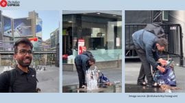 Man in Canada washing clothes under public fountain