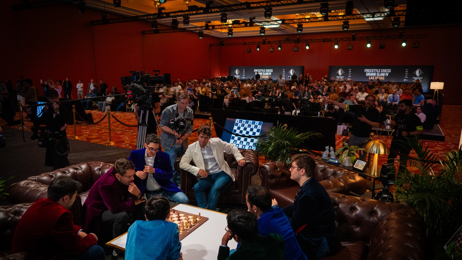 Fans inside competition venue, allowing noise and making players wear headphones: How chess’s perennial quest to become a spectator sport is playing out