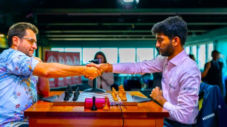 World champion Gukesh takes on veteran grandmaster Levon Aronian in a game at the Saint Louis Rapid and Blitz tournament. (PHOTO: Crystal Fuller via Grand Chess Tour)