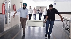 Vigilance Files 40,000-Page Chargesheet in 4 Trunks Against Bikramjit Singh Majithia at Mohali District Court on Friday.