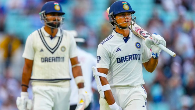 India's Yashasvi Jaiswal, right, and India's Akash Deep walk off the field after the second day's play of the fifth cricket test match between England and India at The Kia Oval in London, Friday, Aug. 1, 2025. (AP Photo)