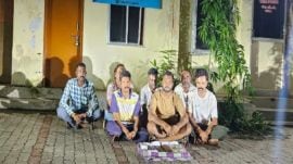 According to Panchmahal police, the AAP leader, Ashish Kamdar (front row, centre), and six others were arrested during a raid at a house. (Express Photo)