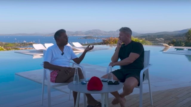 Former IPL commissioner Lalit Modi gives an interview to ex-Australian cricketer Michael Clarke at his home in Sardinia. (Screengrab via Beyond23 Cricket Podcast YouTube)