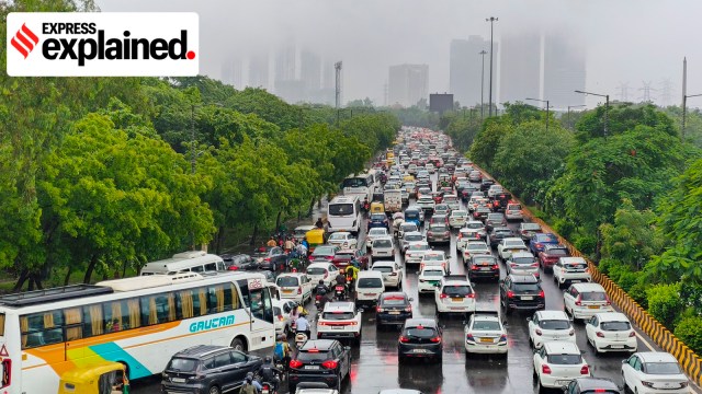 Vehicles stuck in traffic jam after rainfall, near Sector 16, in Noida, Thursday, Aug. 14, 2025.